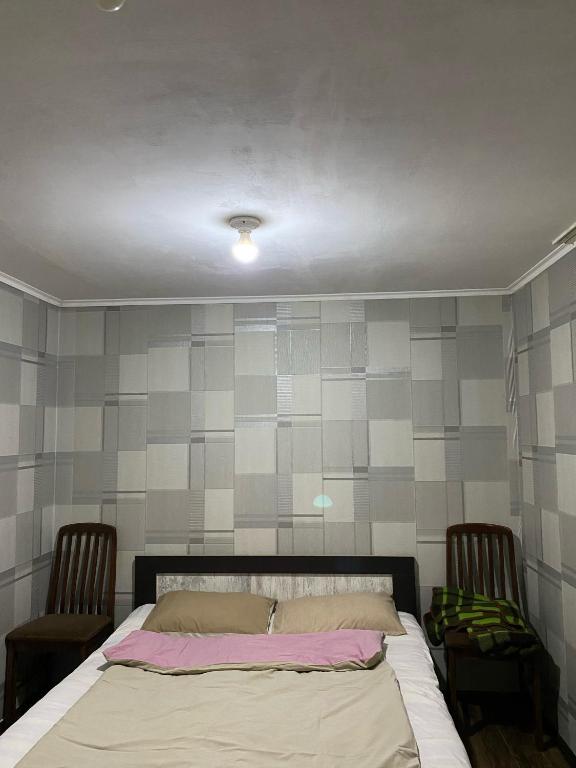 Postel nebo postele na pokoji v ubytování T Rooms