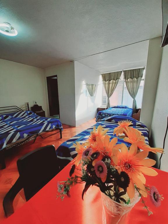 Postel nebo postele na pokoji v ubytování Hotel Central