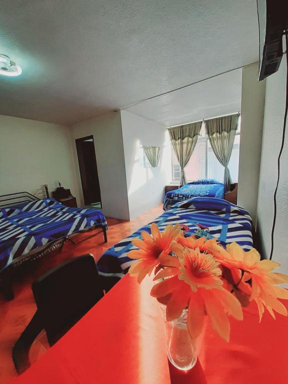 Postel nebo postele na pokoji v ubytování Hotel Central