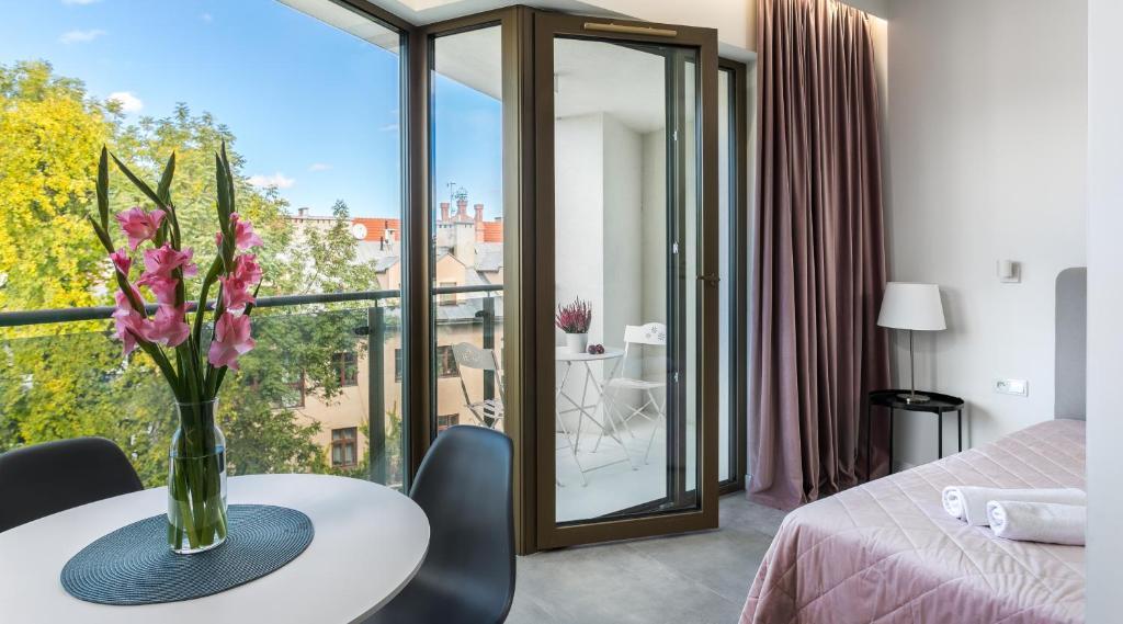 Posteľ alebo postele v izbe v ubytovaní MY KRAKOW Apartments - Rakowicka