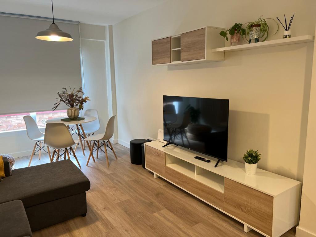TV a/nebo společenská místnost v ubytování Apartamento Quintana