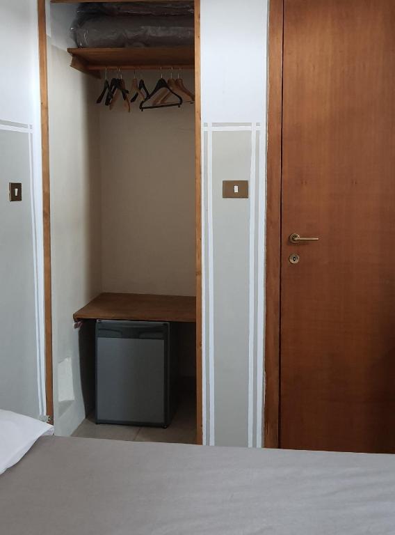 Posteľ alebo postele v izbe v ubytovaní Albergo Avalon