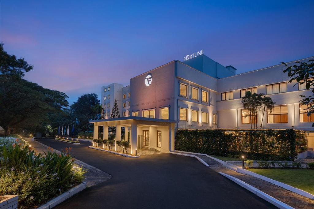 a building with a sign on the side of it at Fortune Valley View, Manipal - Member ITC's Hotel Group in Manipal