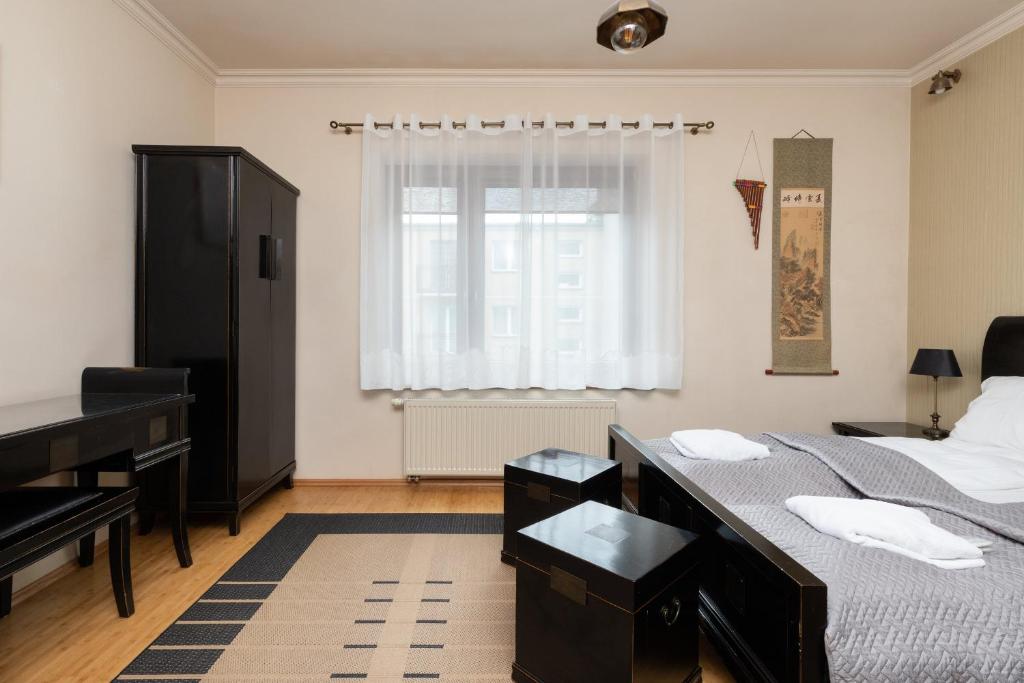 Posteľ alebo postele v izbe v ubytovaní Gdynia Centrum Wyjątkowy Apartament przy Promenadzie z Balkonem by Noclegi Renters