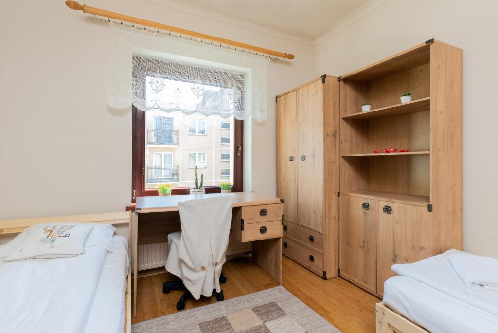 Posteľ alebo postele v izbe v ubytovaní Gdynia Centrum Wyjątkowy Apartament przy Promenadzie z Balkonem by Noclegi Renters