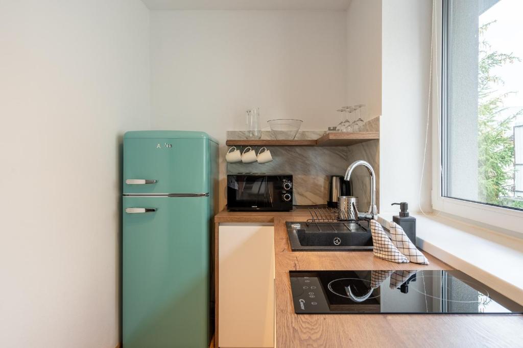 Kuchyň nebo kuchyňský kout v ubytování Apartmány Oravskie
