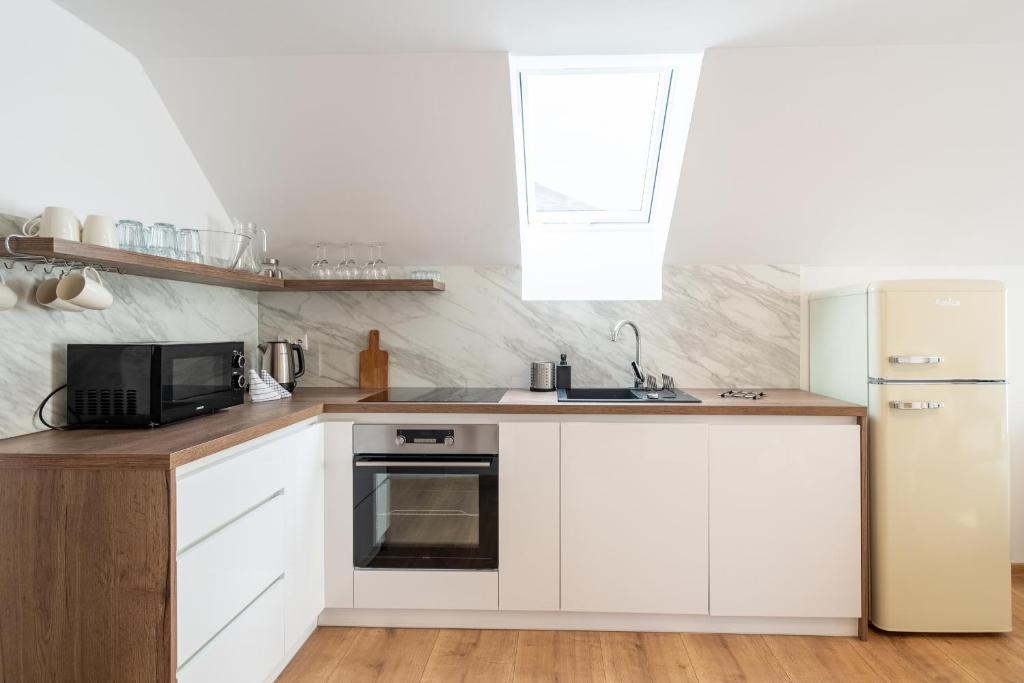 Kuchyň nebo kuchyňský kout v ubytování Apartmány Oravskie