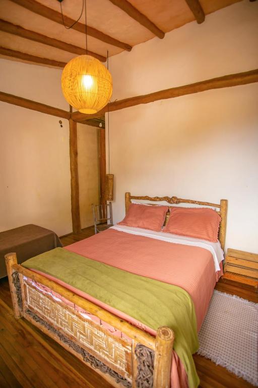 Cama ou camas em um quarto em Casa da Arquiteta Guest House