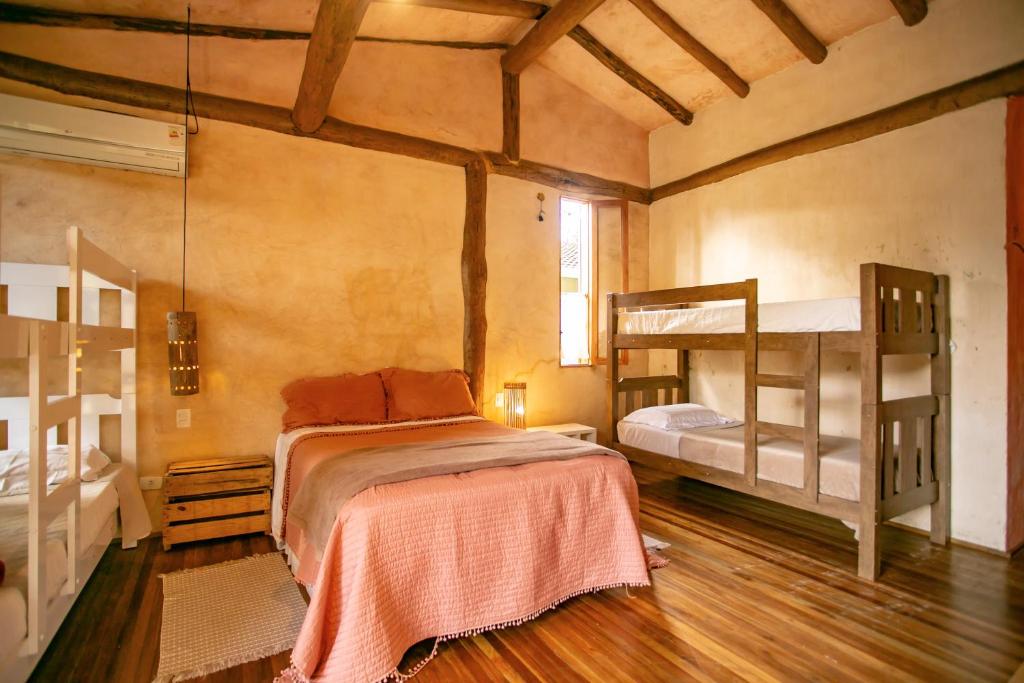 Cama ou camas em um quarto em Casa da Arquiteta Guest House