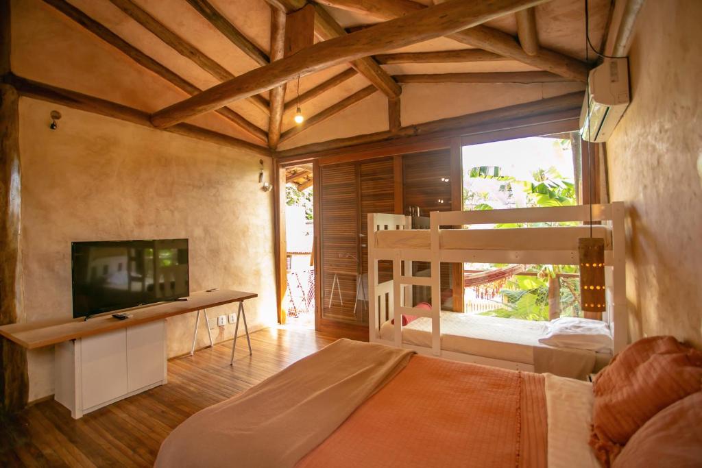 Cama ou camas em um quarto em Casa da Arquiteta Guest House