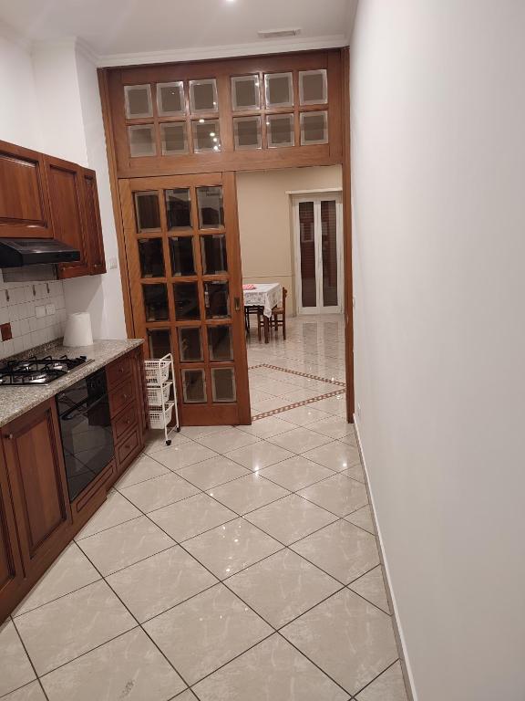 Kuchyňa alebo kuchynka v ubytovaní Anna Roma House