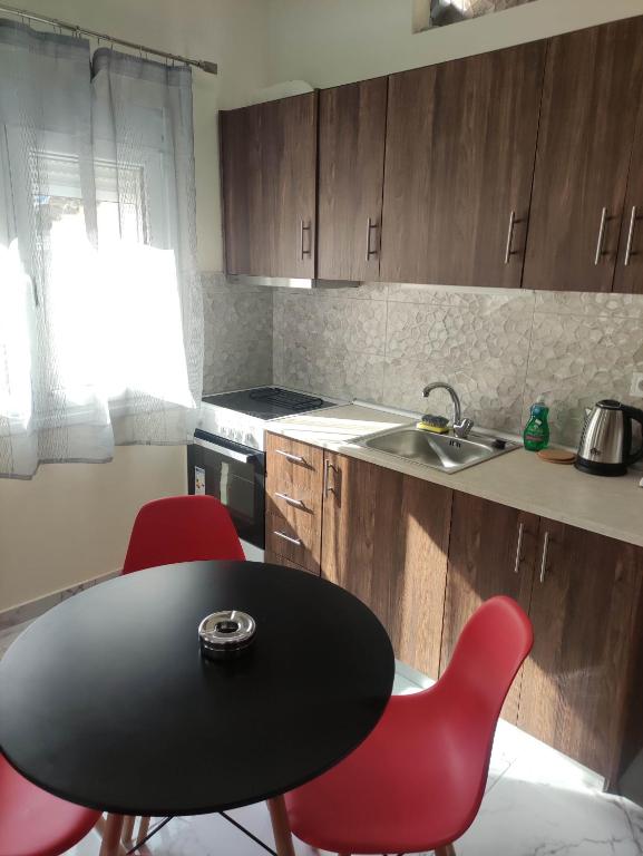 Kuchyň nebo kuchyňský kout v ubytování GCM 2 ROOMS kentro