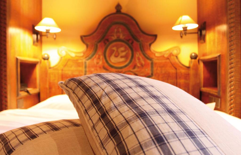 Postel nebo postele na pokoji v ubytování Hôtel le Moulin