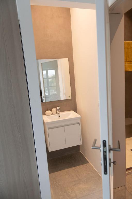 Koupelna v ubytování Privilege Suite