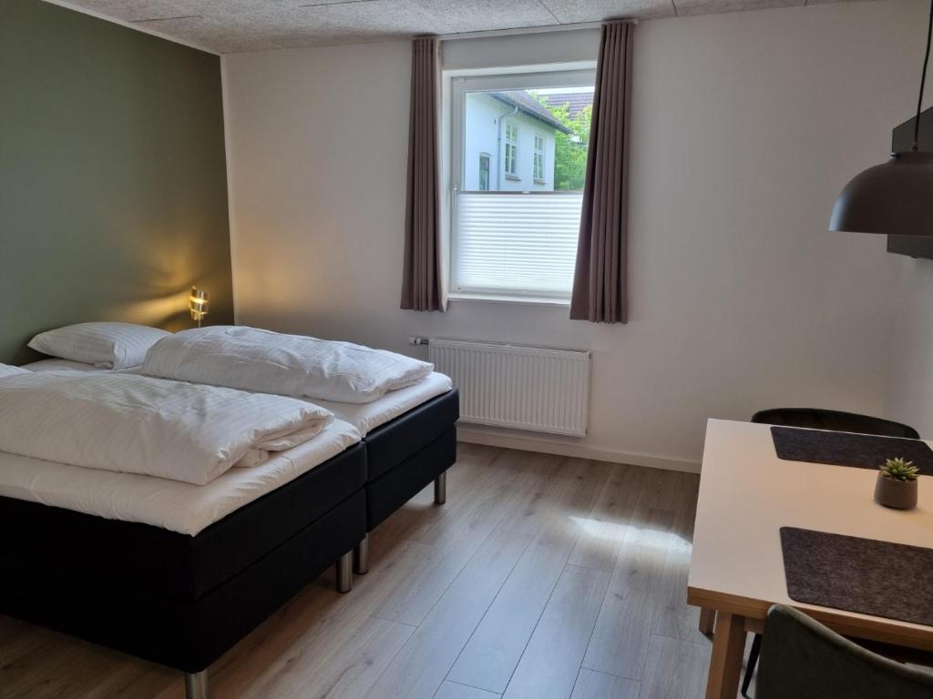 Postel nebo postele na pokoji v ubytování Go Sleep Vandel
