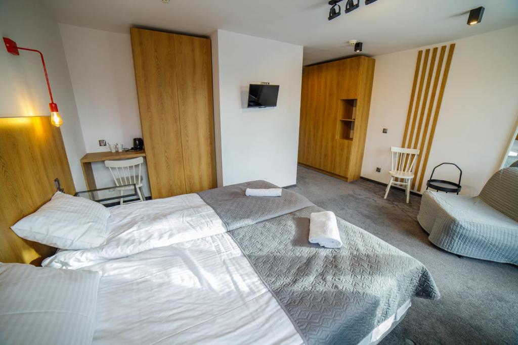 Postel nebo postele na pokoji v ubytování Krokus