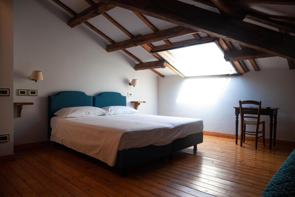 Letto o letti in una camera di Agrilocanda Val Campotto