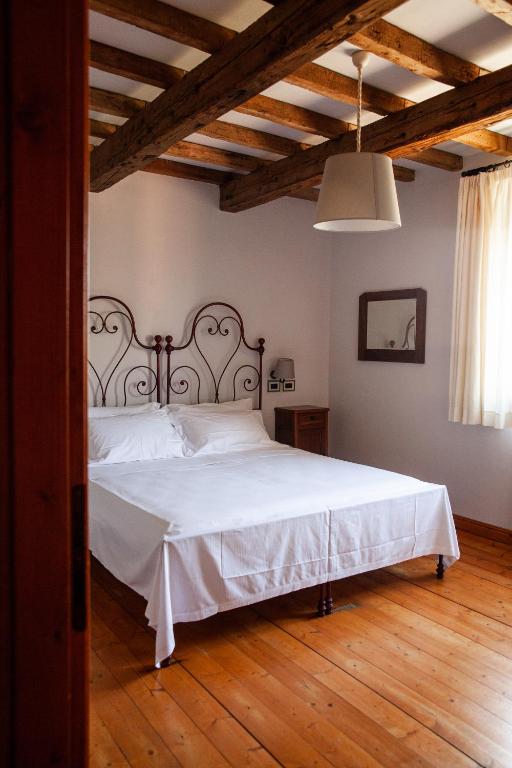 Letto o letti in una camera di Agrilocanda Val Campotto