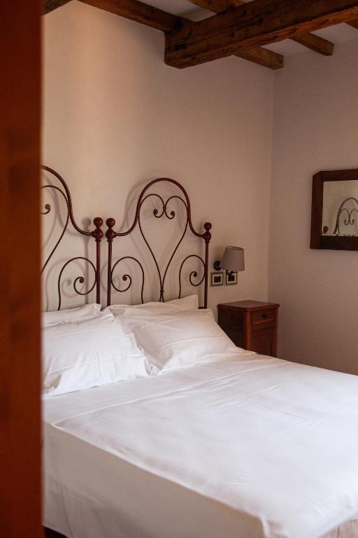 Letto o letti in una camera di Agrilocanda Val Campotto