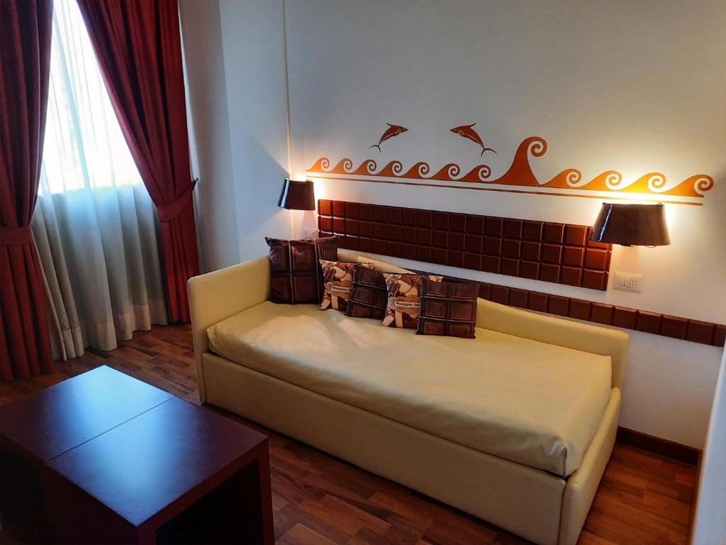 Postel nebo postele na pokoji v ubytování Chocohotel