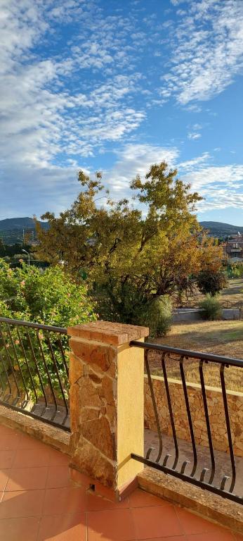 A balcony or terrace at Dimora Pintau in residence con piscina privata
