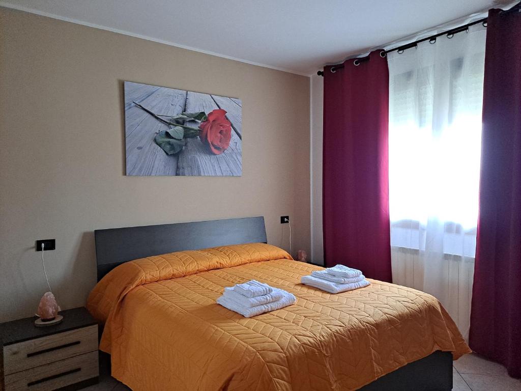 Łóżko lub łóżka w pokoju w obiekcie Appartamento Roverella