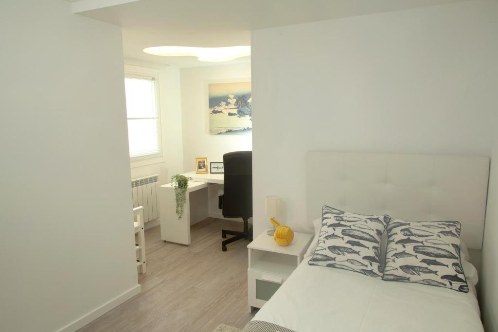 Posteľ alebo postele v izbe v ubytovaní Aukera Apartment I by Basque Homes