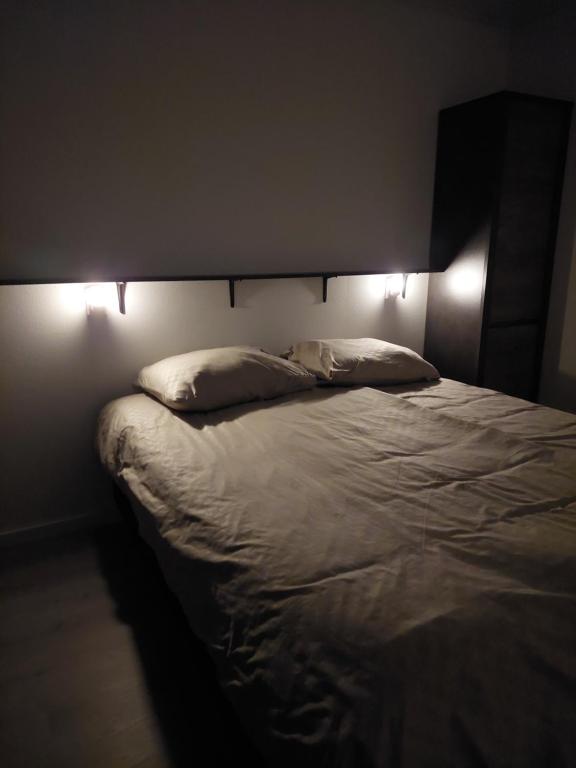 Postel nebo postele na pokoji v ubytování Chalet Moderna Putten
