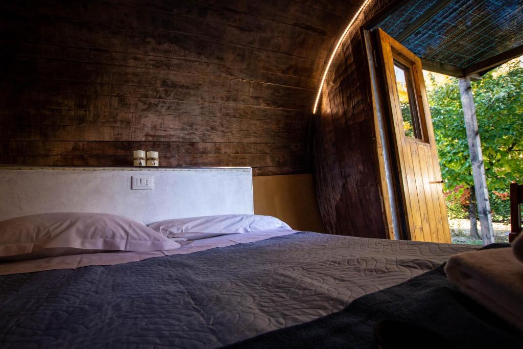 Postel nebo postele na pokoji v ubytování Albavillage Hotel Wellness & Camping