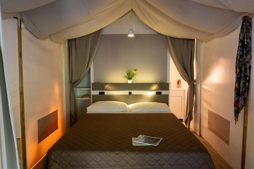 Postel nebo postele na pokoji v ubytování Camping Eden Glamping