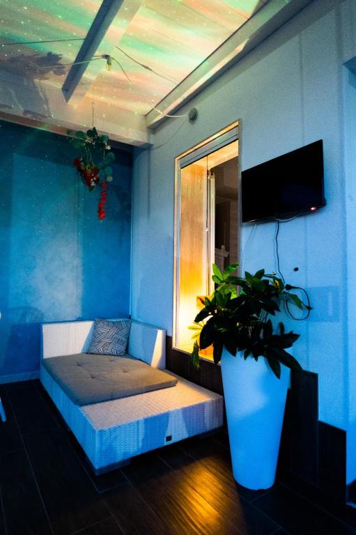 Telewizja i/lub zestaw kina domowego w obiekcie Resort Villa La Perla Sul Mare