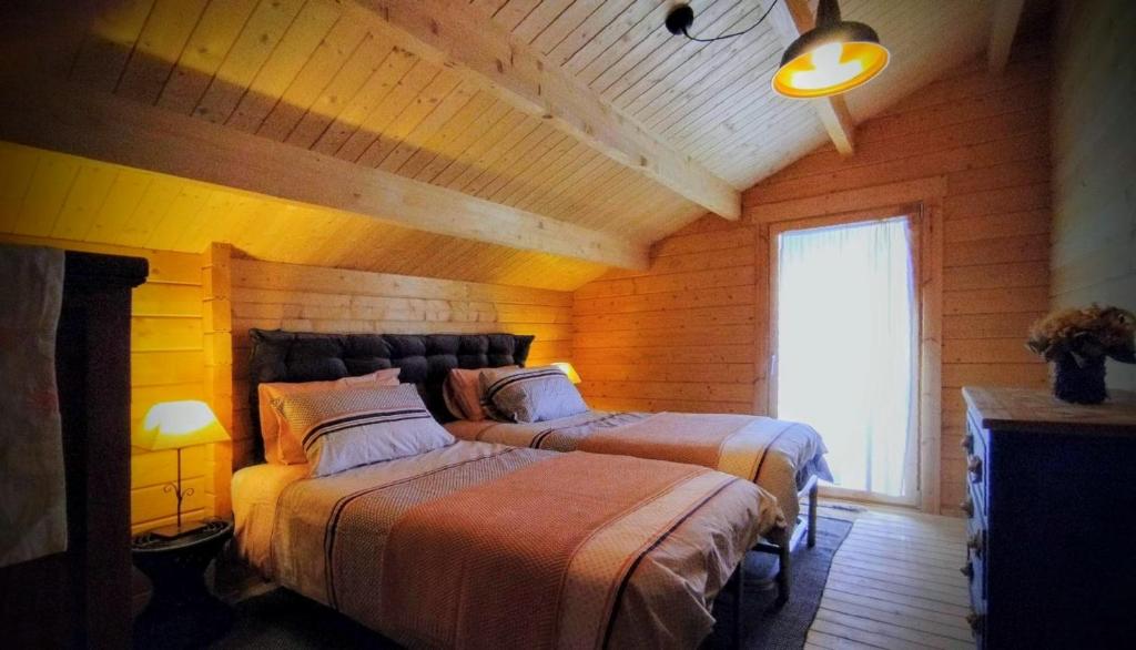 Postel nebo postele na pokoji v ubytování Casa rural El Bujo