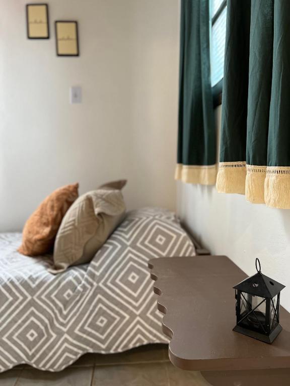 Postel nebo postele na pokoji v ubytování Coco Suites