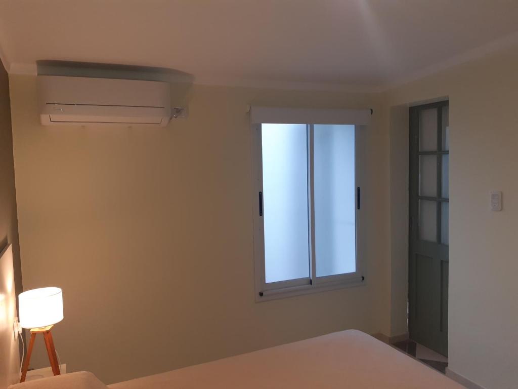 Una cama o camas en una habitación de Bello Jazmin 2