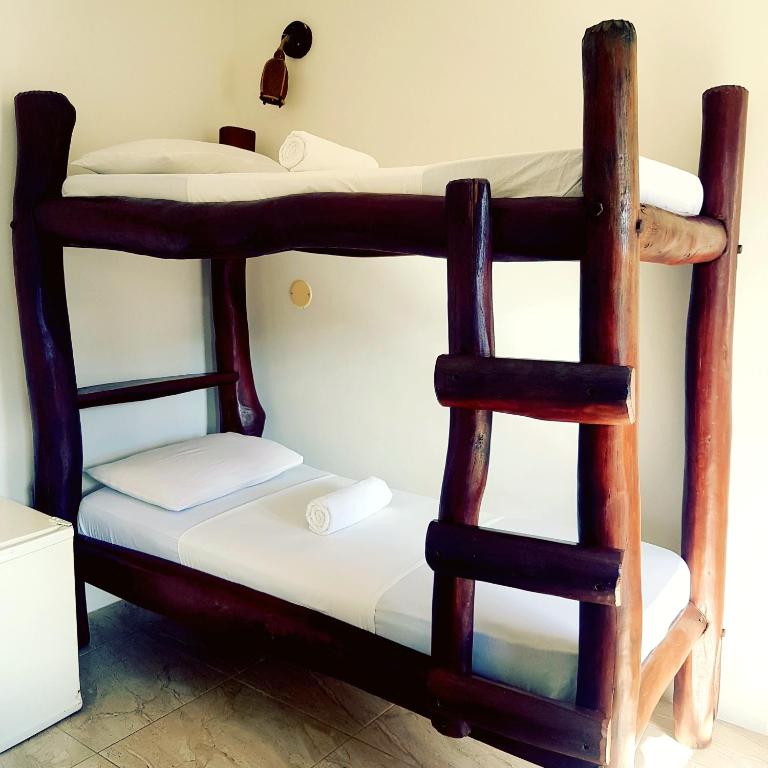 Postel nebo postele na pokoji v ubytování Morro Beach Hotel