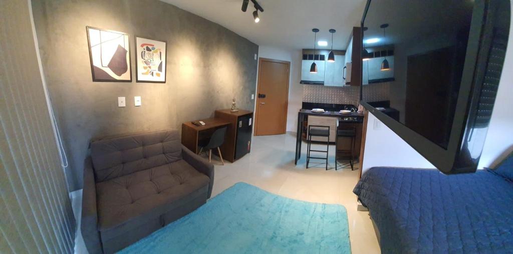 Χώρος καθιστικού στο Studio Novo e Aconchegante no Centro de Guarulhos