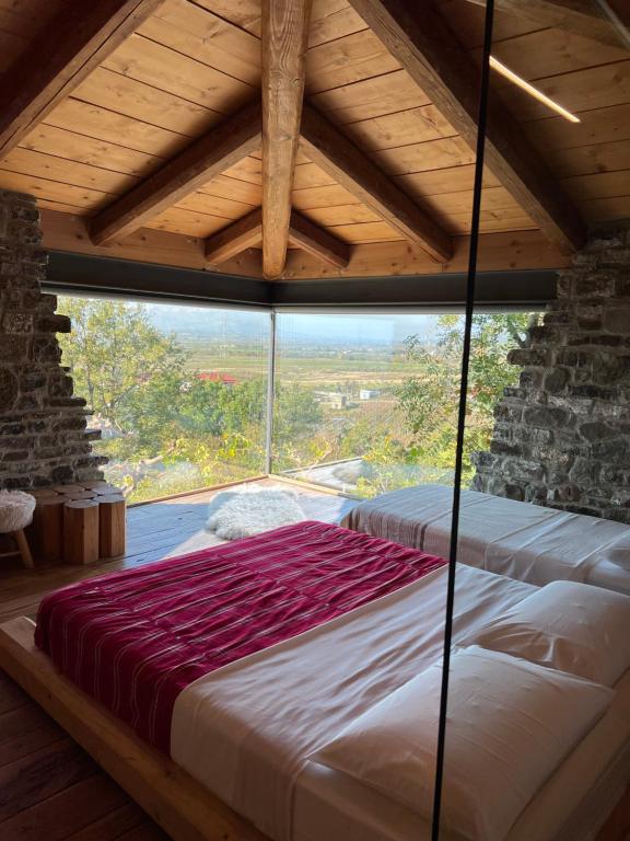 Letto o letti in una camera di Mrizi i Zanave Agroturizëm