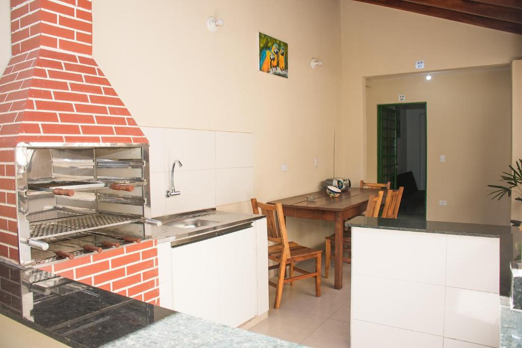 Kuchyň nebo kuchyňský kout v ubytování Apto com Wi-Fi em Monte Castelo - Campo Grande MS