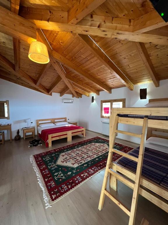 Letto o letti in una camera di Mrizi i Zanave Agroturizëm