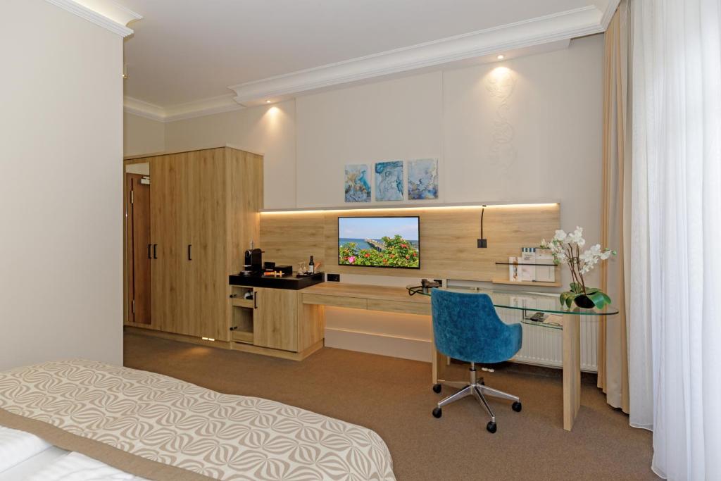 Postel nebo postele na pokoji v ubytování HOTEL am STRAND