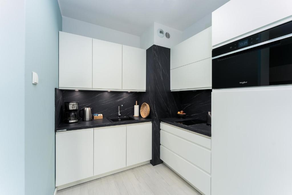 Kuchnia lub aneks kuchenny w obiekcie Klif Apartamenty Nadmorskie Tarasy D601