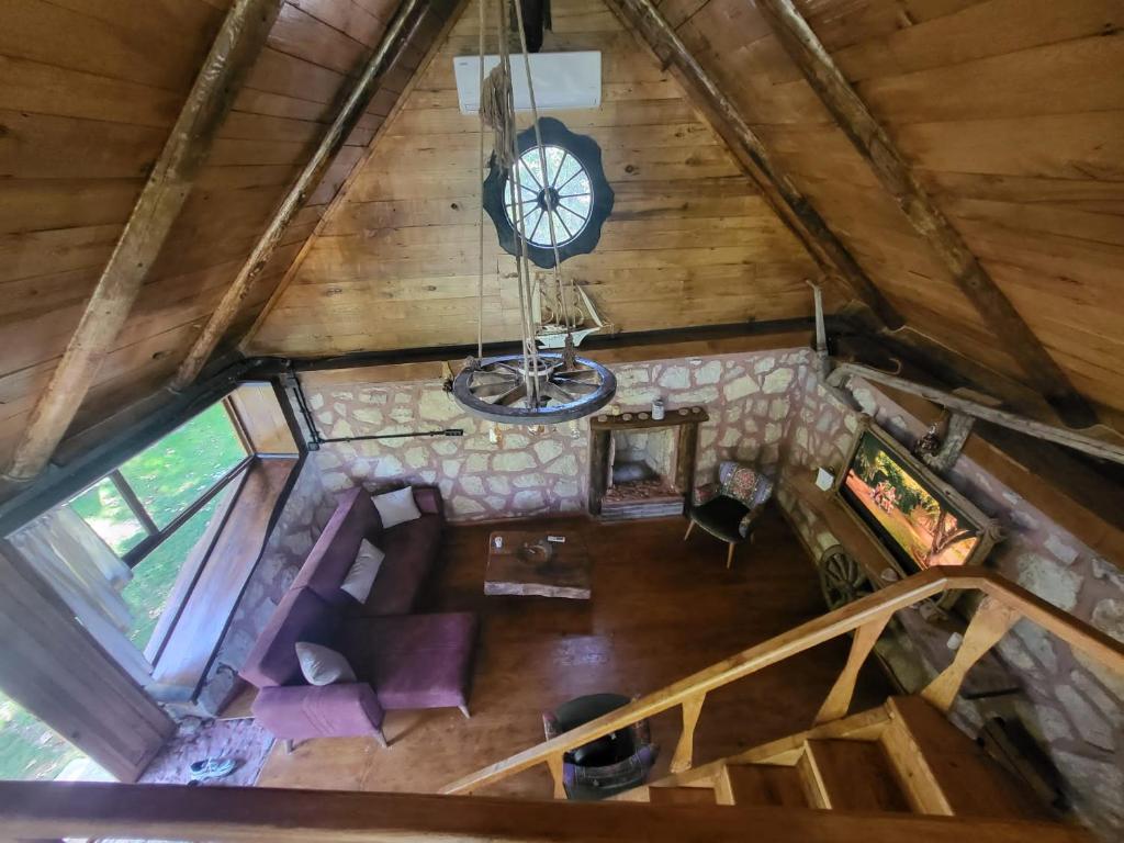an overhead view of a living room with a clock at Taş_suit in Kartepe
