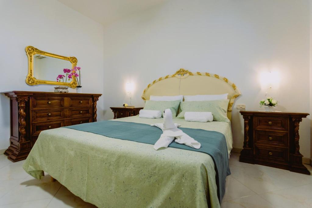 Postel nebo postele na pokoji v ubytování Casa da Maddalena e Andrea