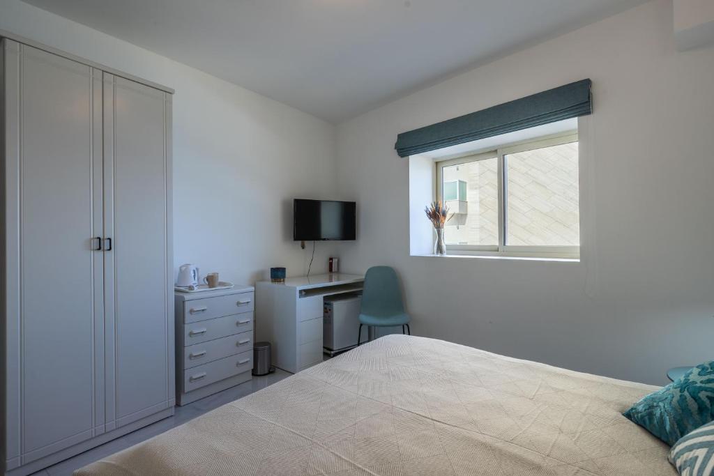 Postel nebo postele na pokoji v ubytování Sliema Bedrooms with ensuite bathrooms