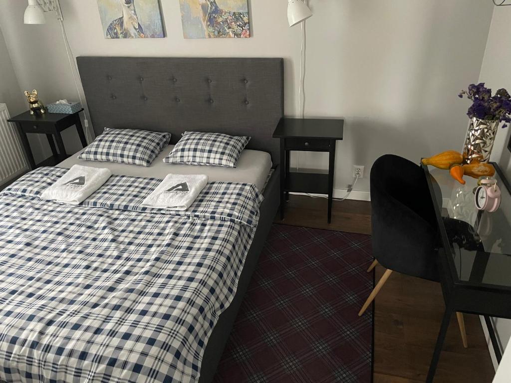 Posteľ alebo postele v izbe v ubytovaní Apartament RESORT Chełmońskiego Śrem