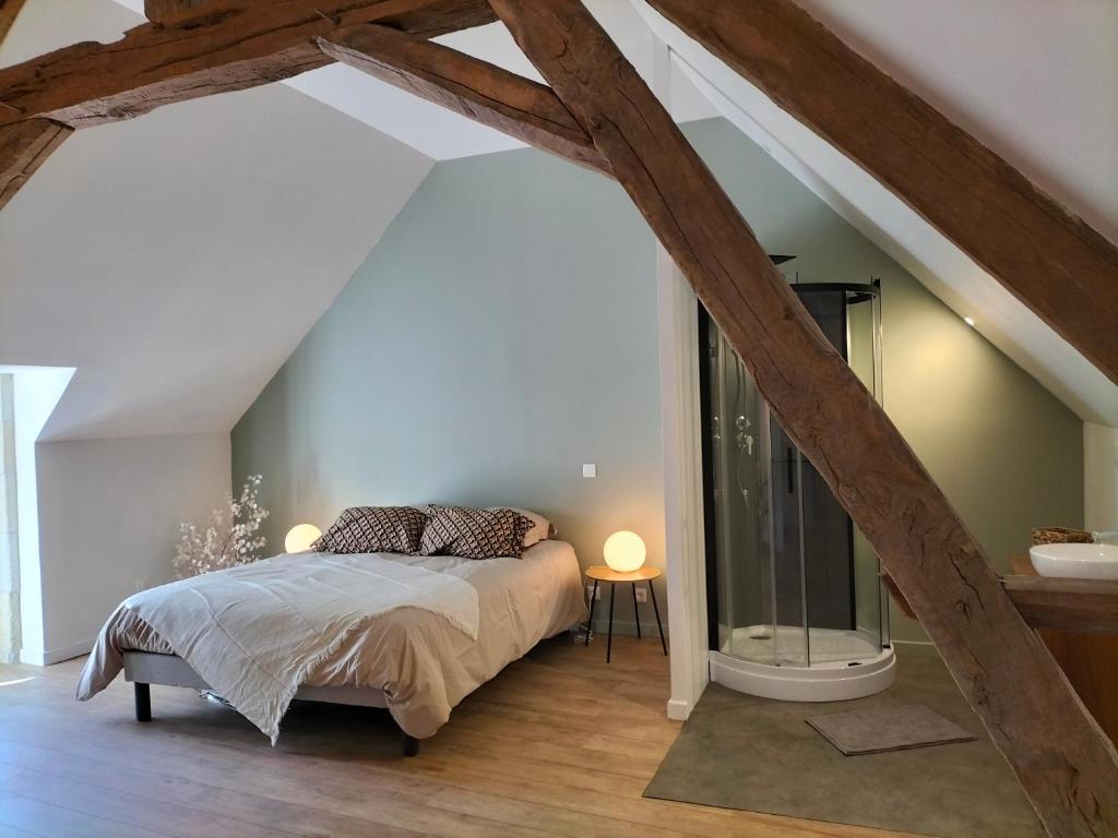 Postel nebo postele na pokoji v ubytování Les prés du petit Morlu - proche Beauval