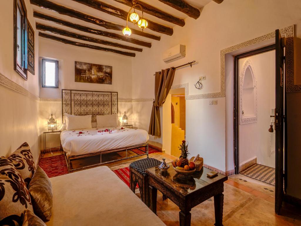Postel nebo postele na pokoji v ubytování Palais Tinmel Marrakech