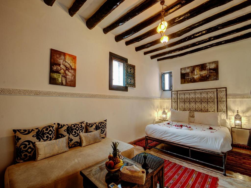 Postel nebo postele na pokoji v ubytování Palais Tinmel Marrakech