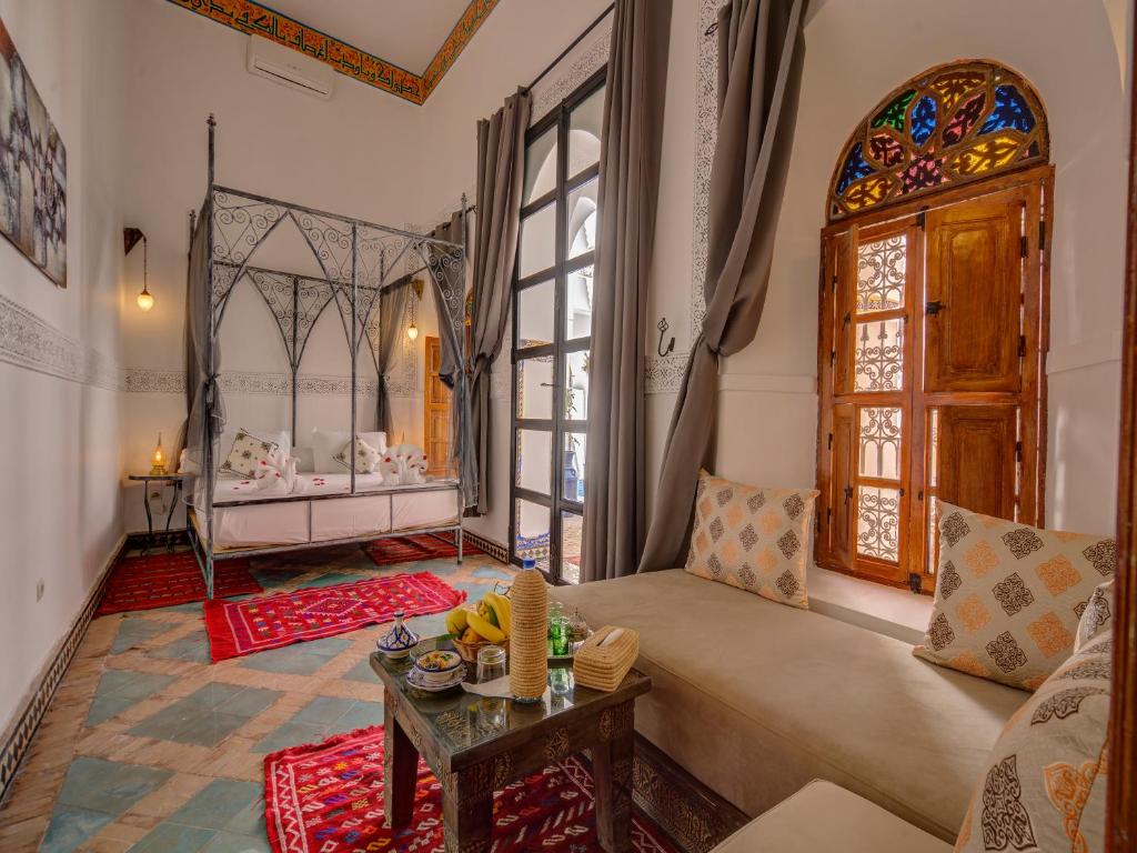 Postel nebo postele na pokoji v ubytování Palais Tinmel Marrakech