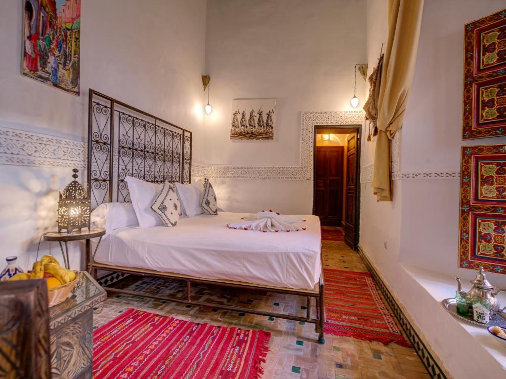 Postel nebo postele na pokoji v ubytování Palais Tinmel Marrakech